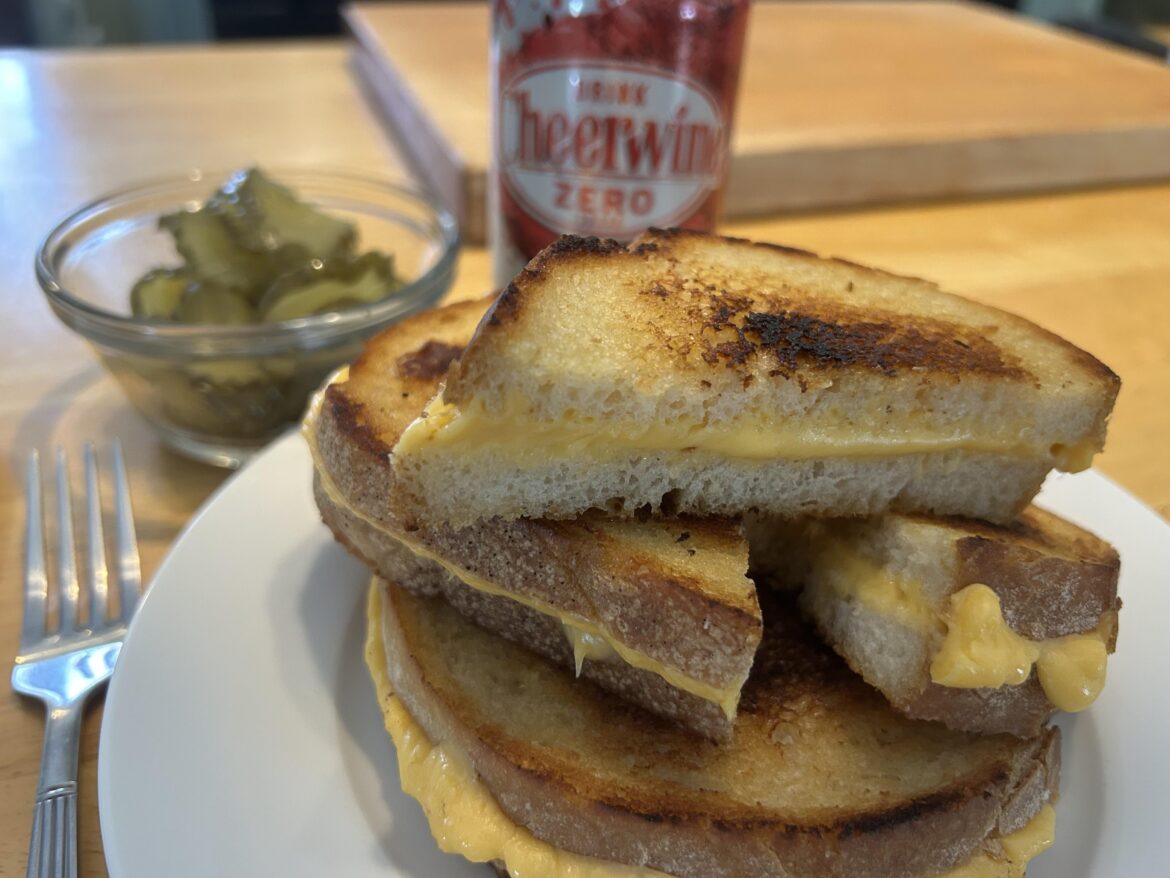 Grilled cheese, side of hamburger dill pickle chips, Cheerwine Zero