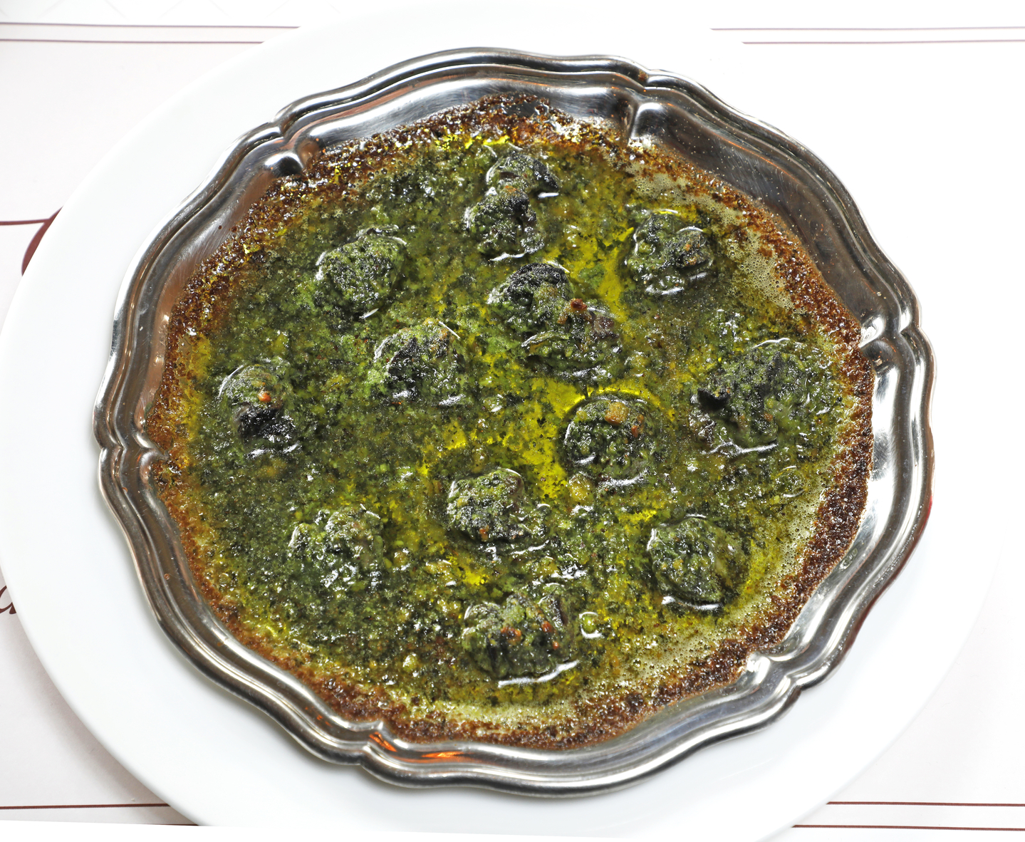 Escargots de Bourgogne served at the French restaurant Chez Laurent [PARK SANG-MOON]