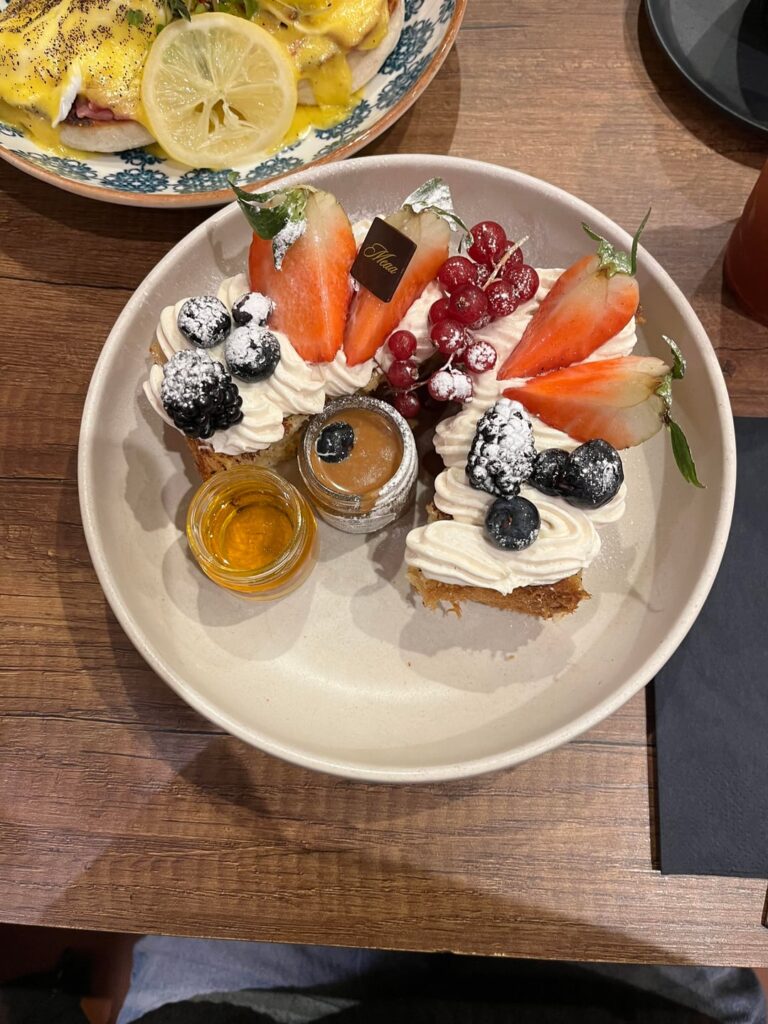 French toast with buttercream frosting, biscoff centre and honey+biscoff on the side