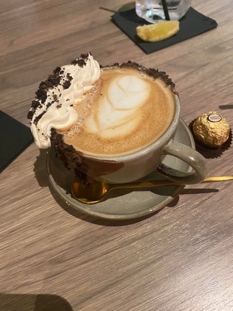 Delicious coffee with Nutella and Oreo crumbles
