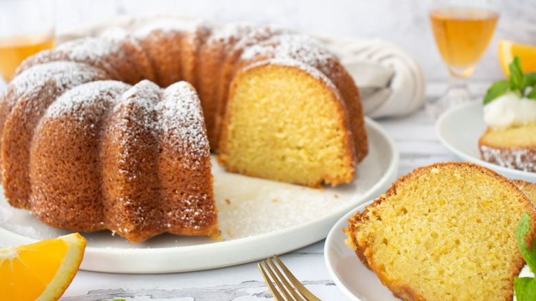 Bundt Italian hangover cake with slices on plates