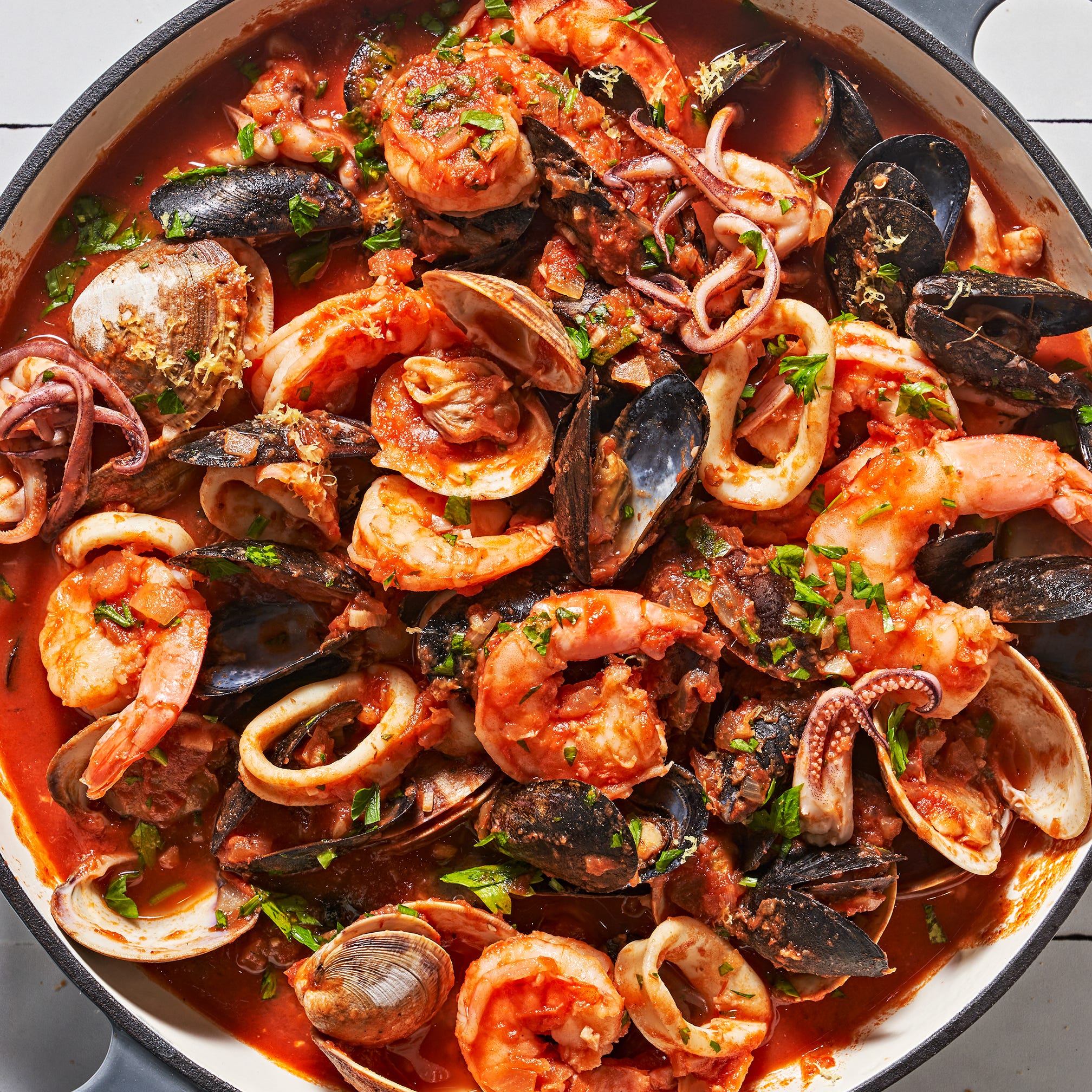 zuppa di pesce with mussels clams shrimp squid tomato white wine andgarlic