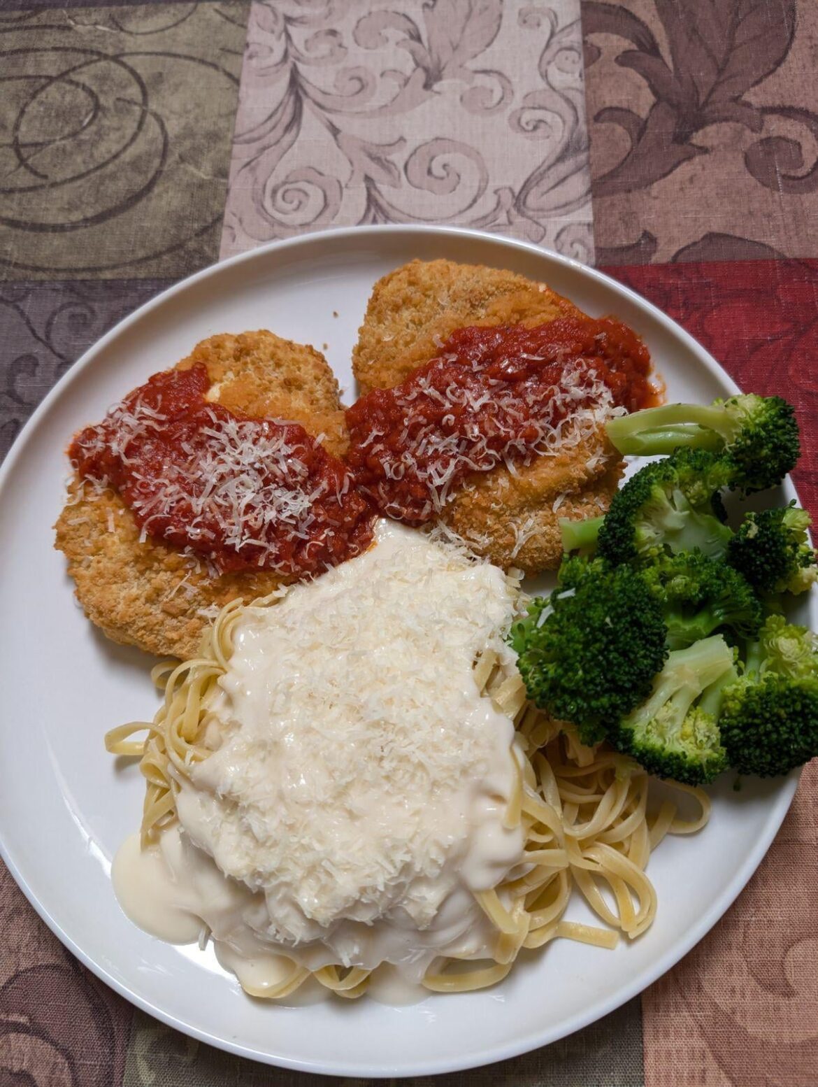 Chicken Parmesan, Fettuccini Alfredo & Broccoli