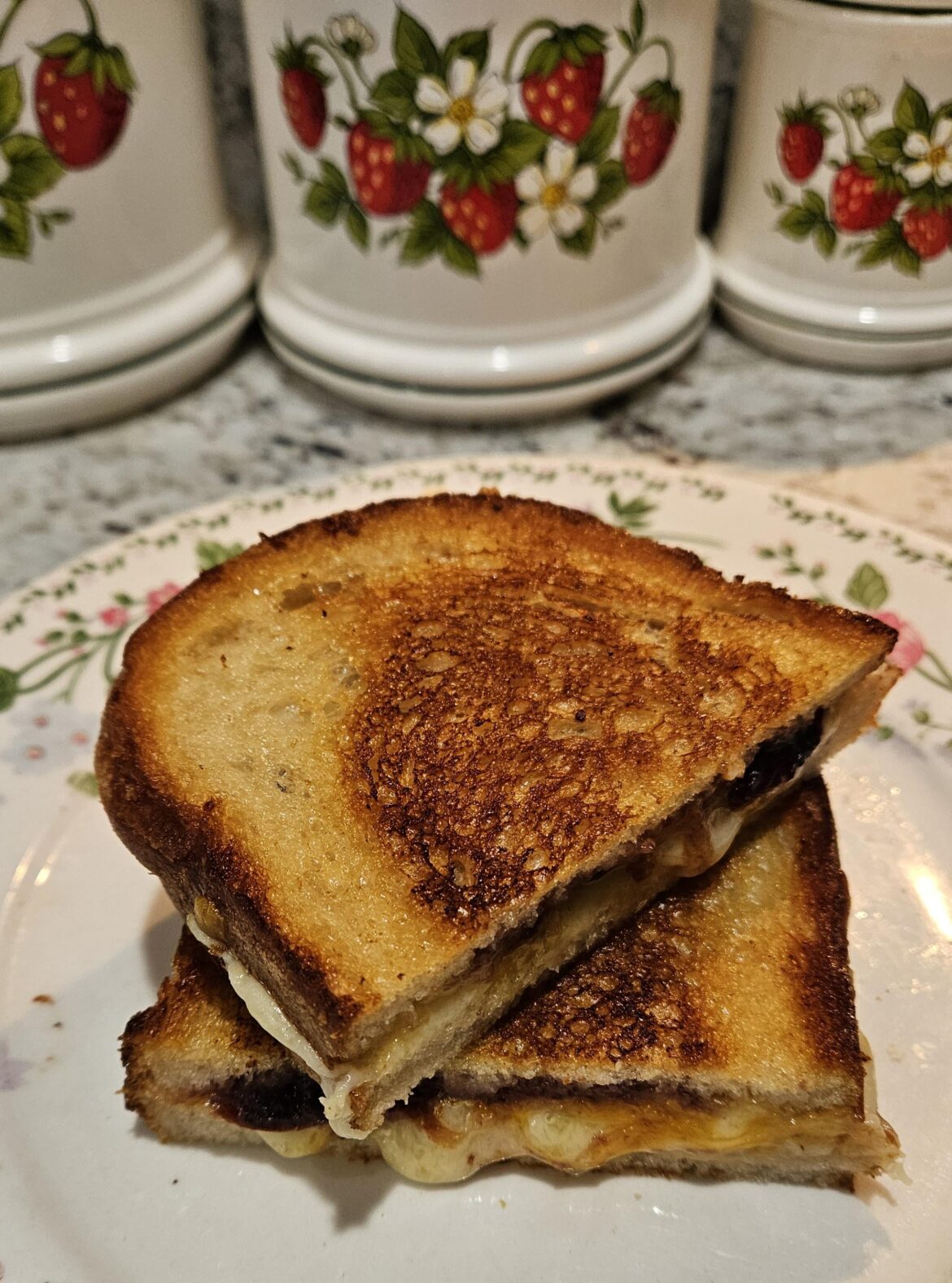cheddar, gruyère, and cherry jam on sourdough