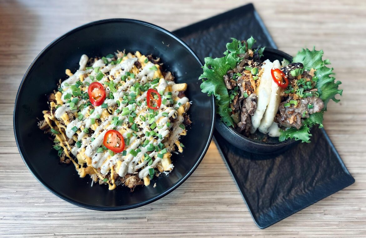 Loaded fries with shredded chicken, cheddar cheese and truffle sauce + bao burgers with beef