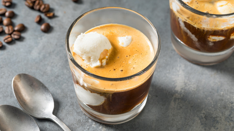 affogato in short glass with coffee beans
