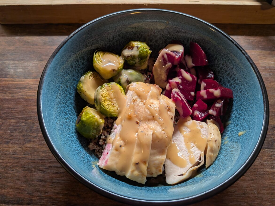Roasted veggie quinoa bowl with chicken and maple tahini dressing ~350 calories