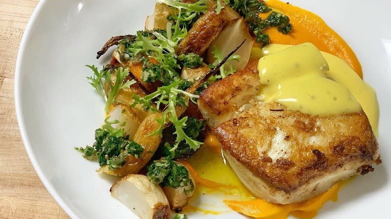 A plate of halibut with turnips at Iozzo's Garden of Italy in Indianapolis