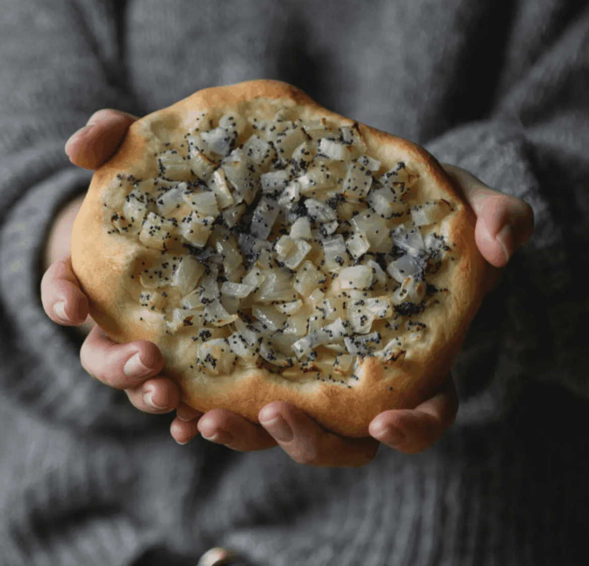 I hope this sub will appreciate my home city's signature snack :) It's called cebularz and it's filled with onion and poppy seeds.