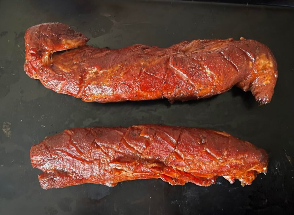 Smoked Pork Loin. Turned out great. Marinade overnight, Apple juice, Meat Church, Gospel, brown sugar. Basted with Sweet Baby Rays, original BBQ sauce an hour in and once more on 2nd hour. Smoked at 225 till internal temp 149. About 3 hours. Tender and moist