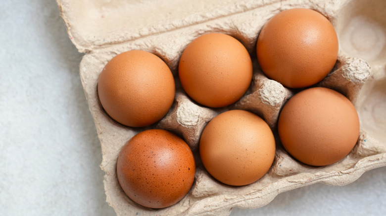 Brown eggs in carton