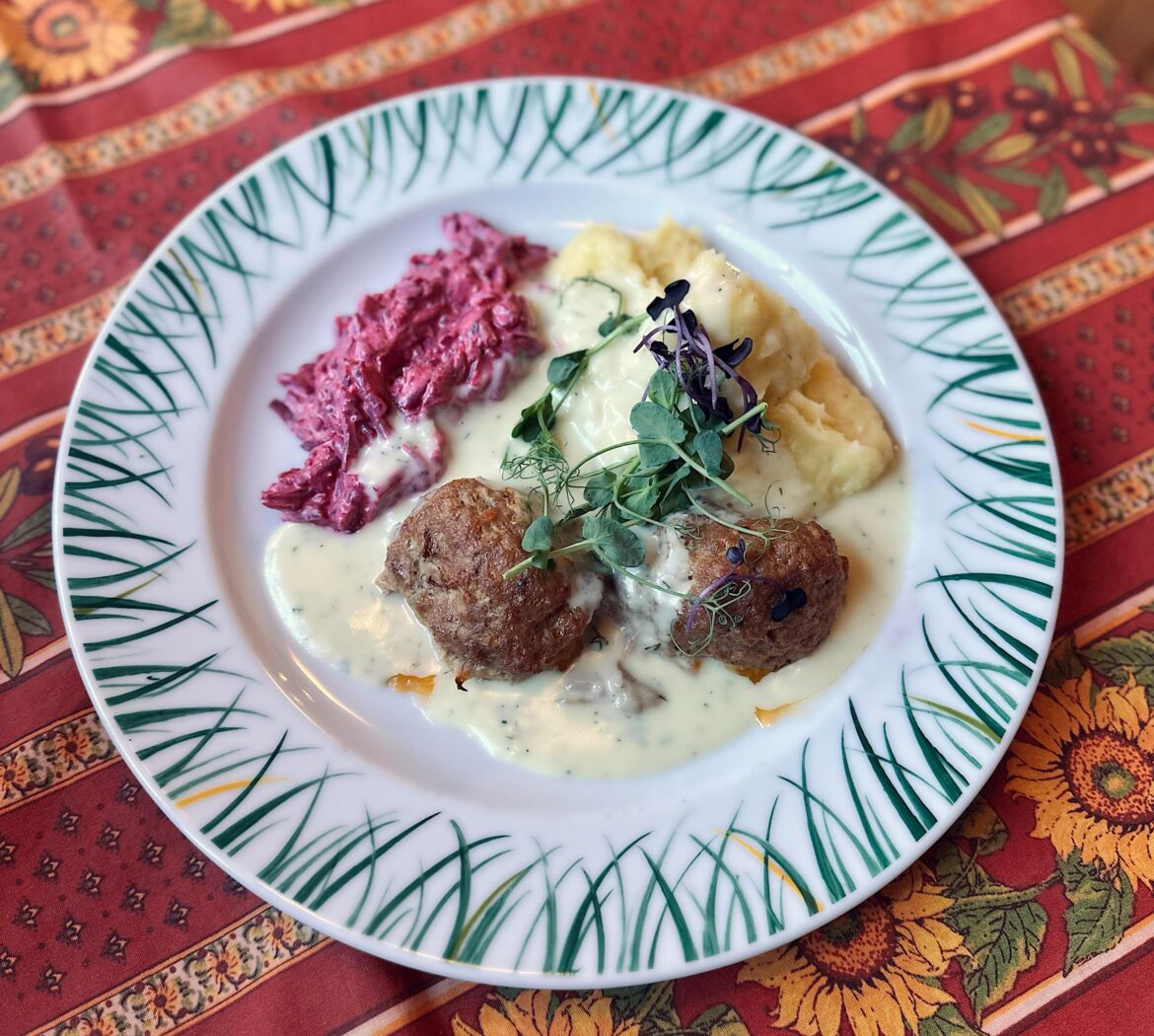 Minced meat cutlets, mashed potatoes, warm creamy herb sauce, beetroot and garlic salad