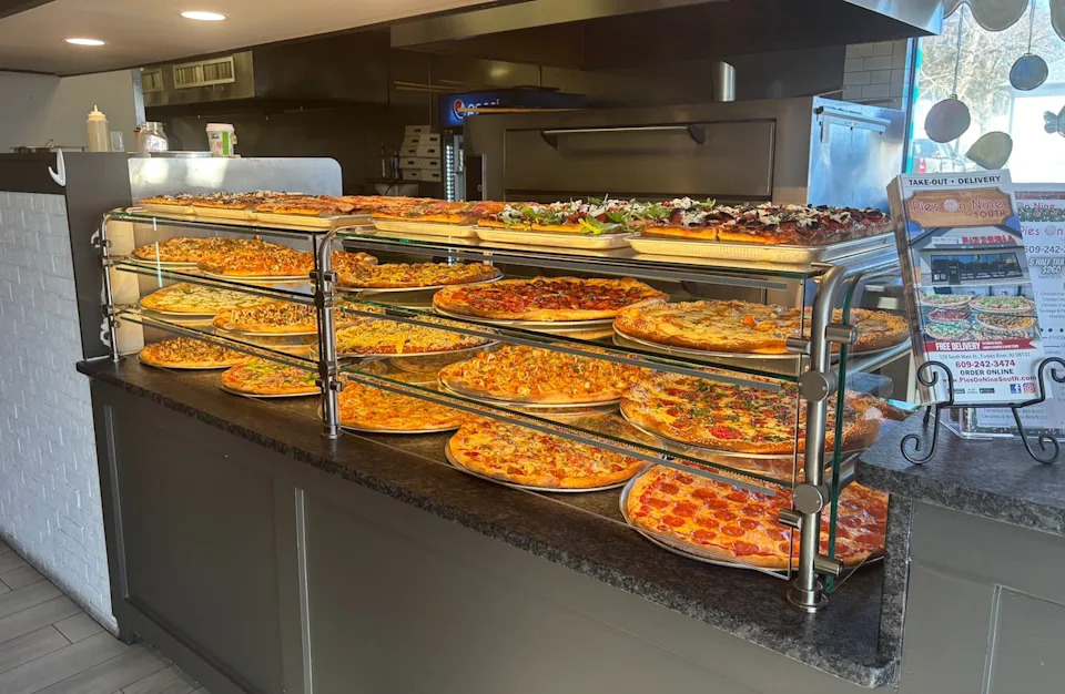 Gourmet pizza selection at Pies on Nine South