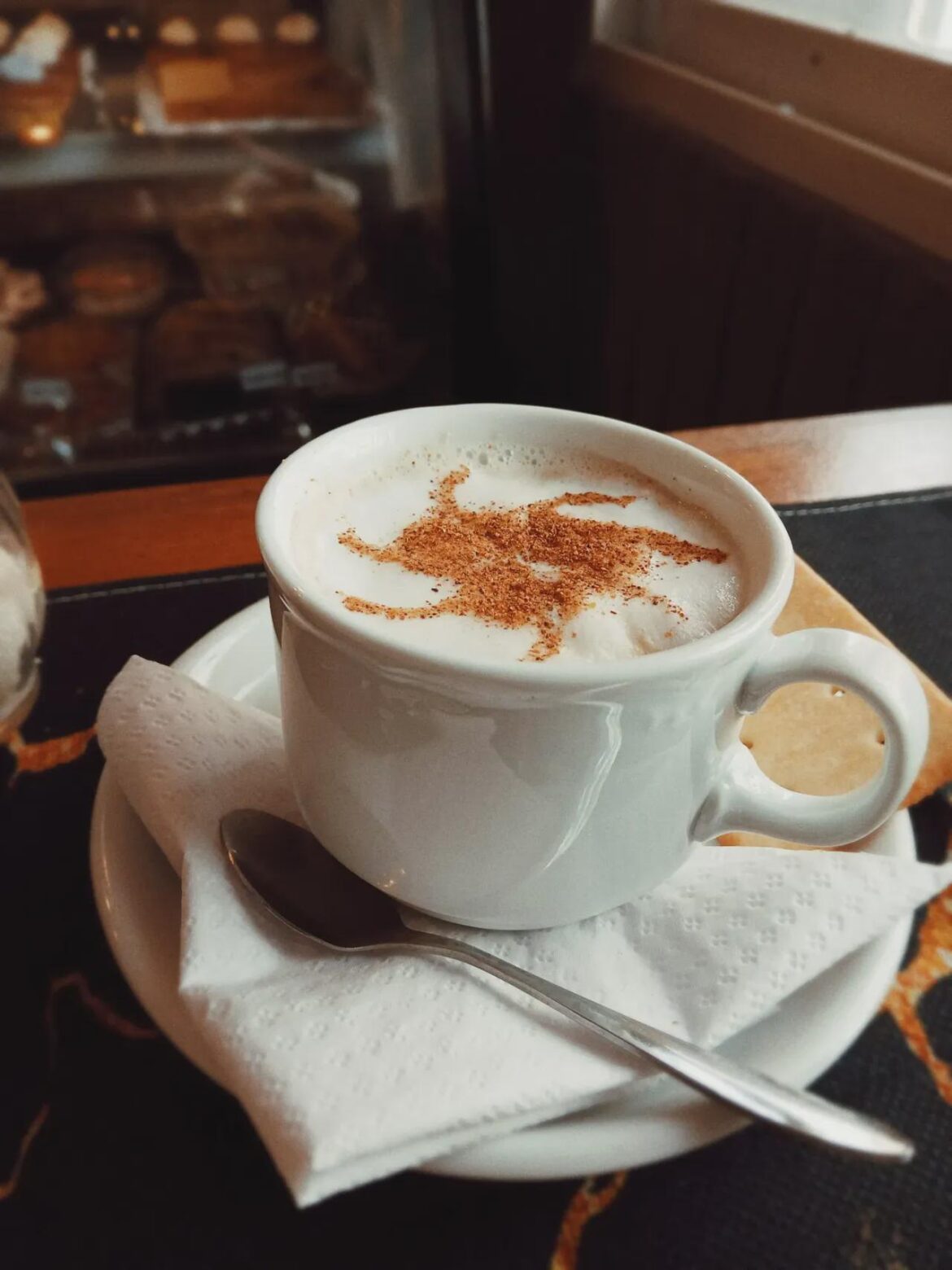 Cappuccino paired with amaretto biscuit