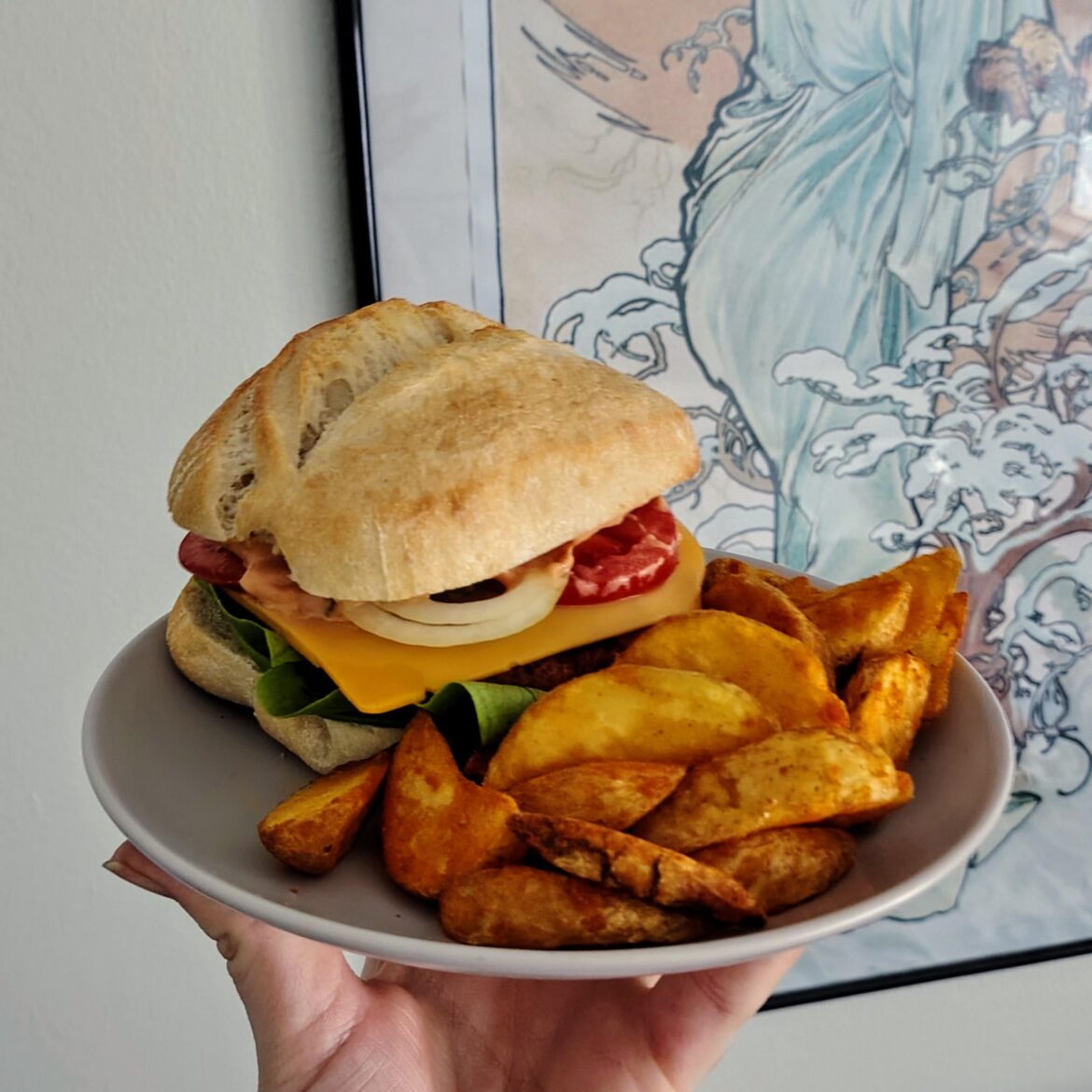 Veggie burger with potato wedges