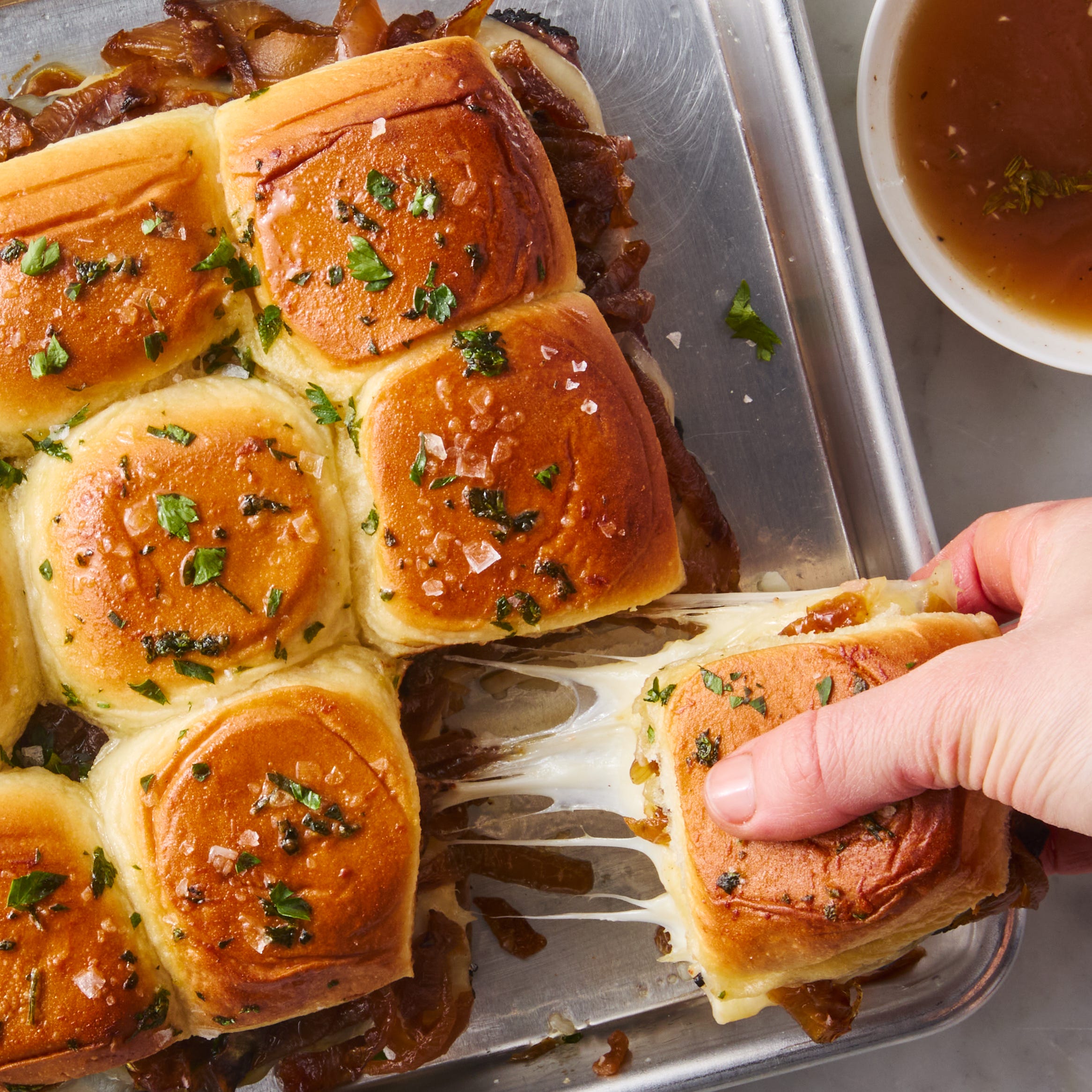 french dip sliders on rolls with au jus
