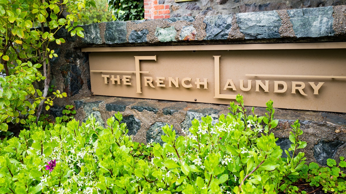 close up of french laundry sign