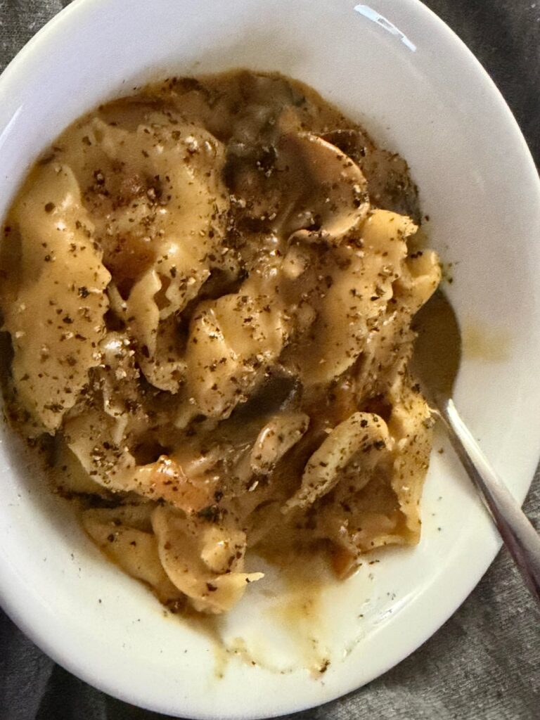 Chicken mozzarella tortellini with elephant garlic and mushroom Alfredo
