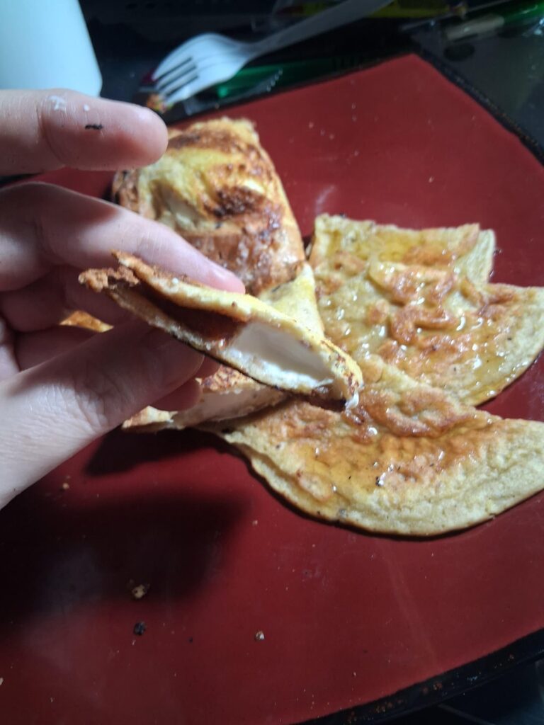 Flattened artisan bread jutsu Guava cream cheese ghetto crustable pastry puff breakfast bliss... leftover egg wash got turned into a pancake.