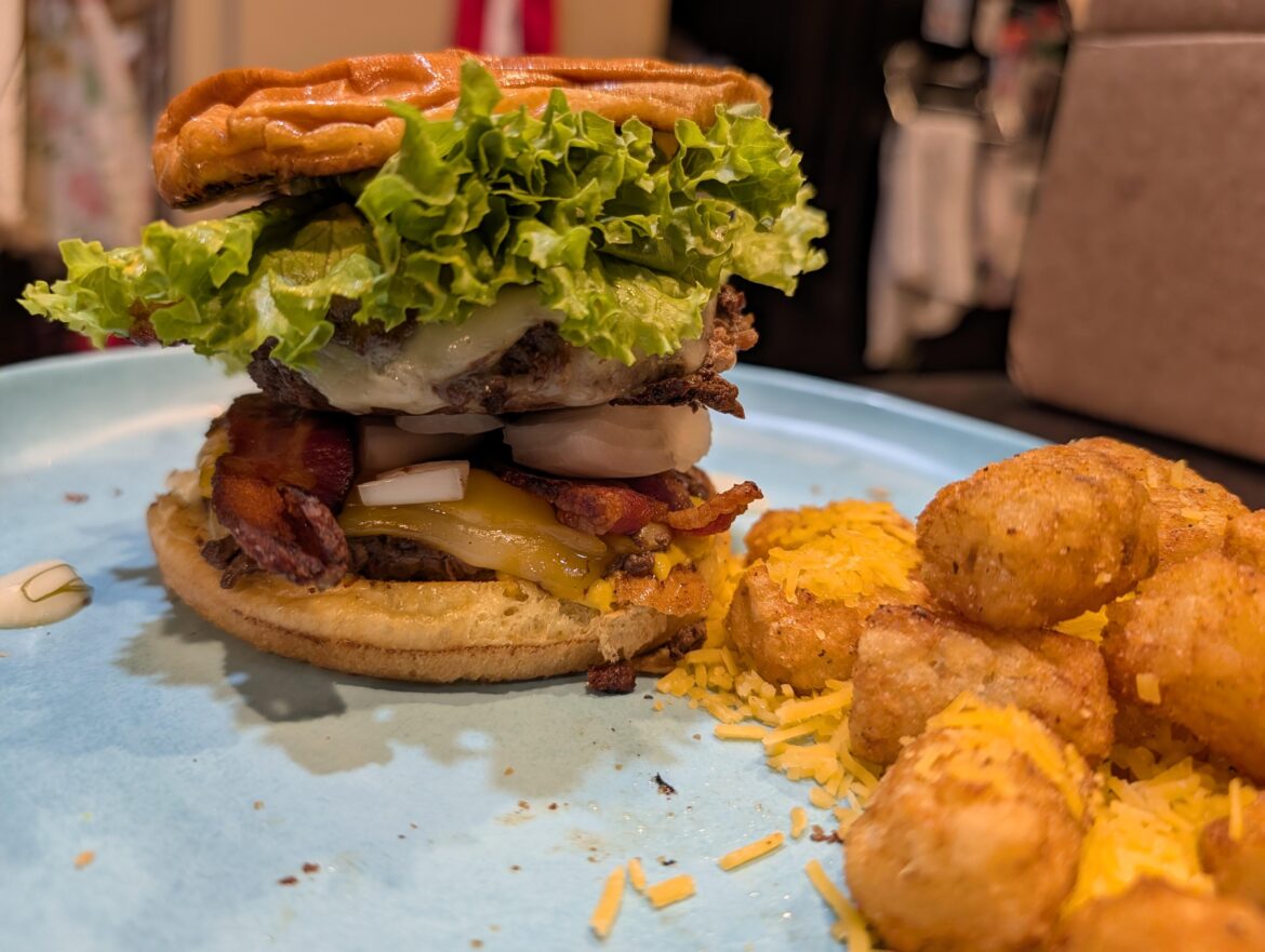 Bacon double on toasted brioche with cheese tots