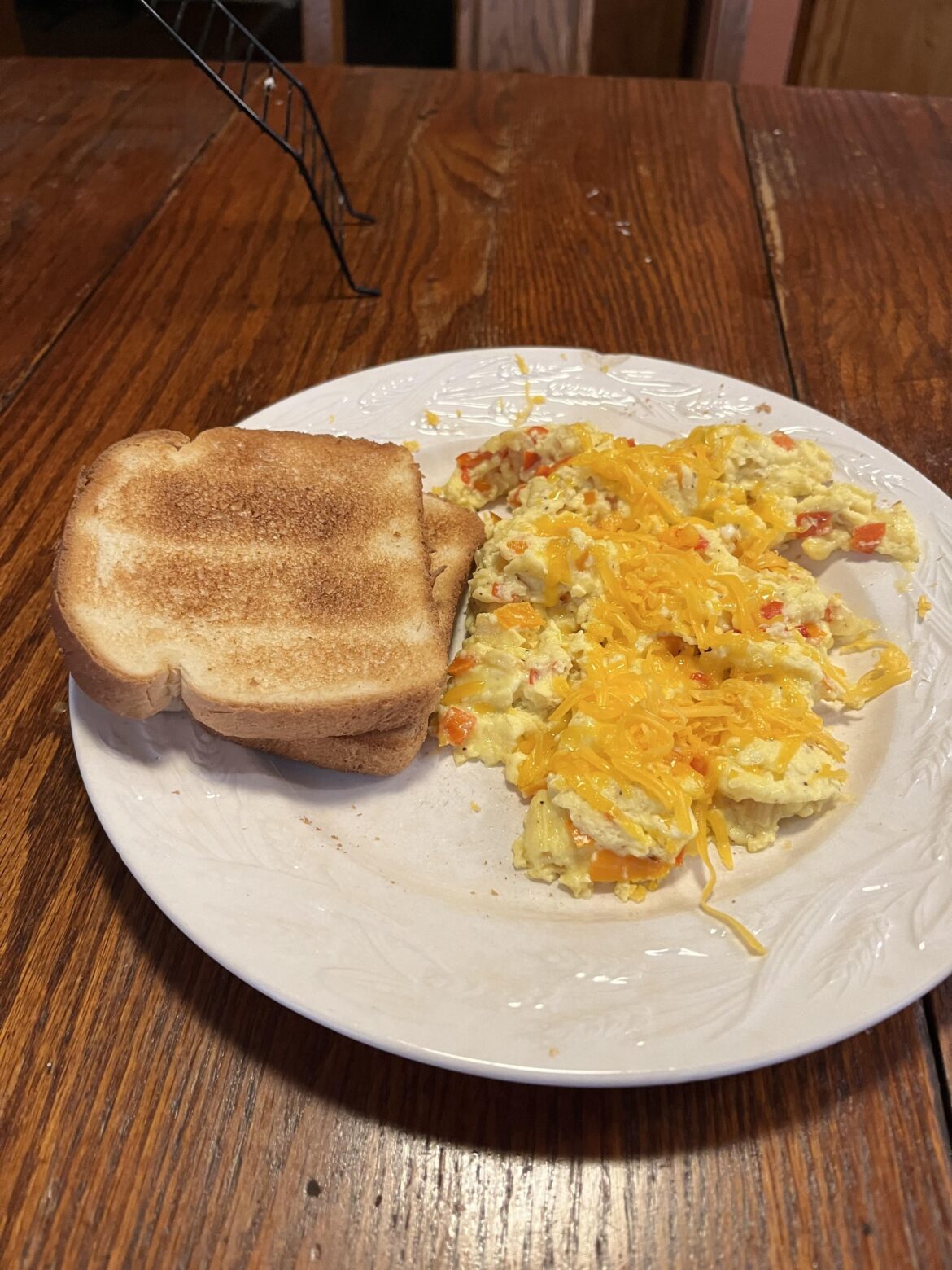 Scramble with peppers, onions, and cheddar