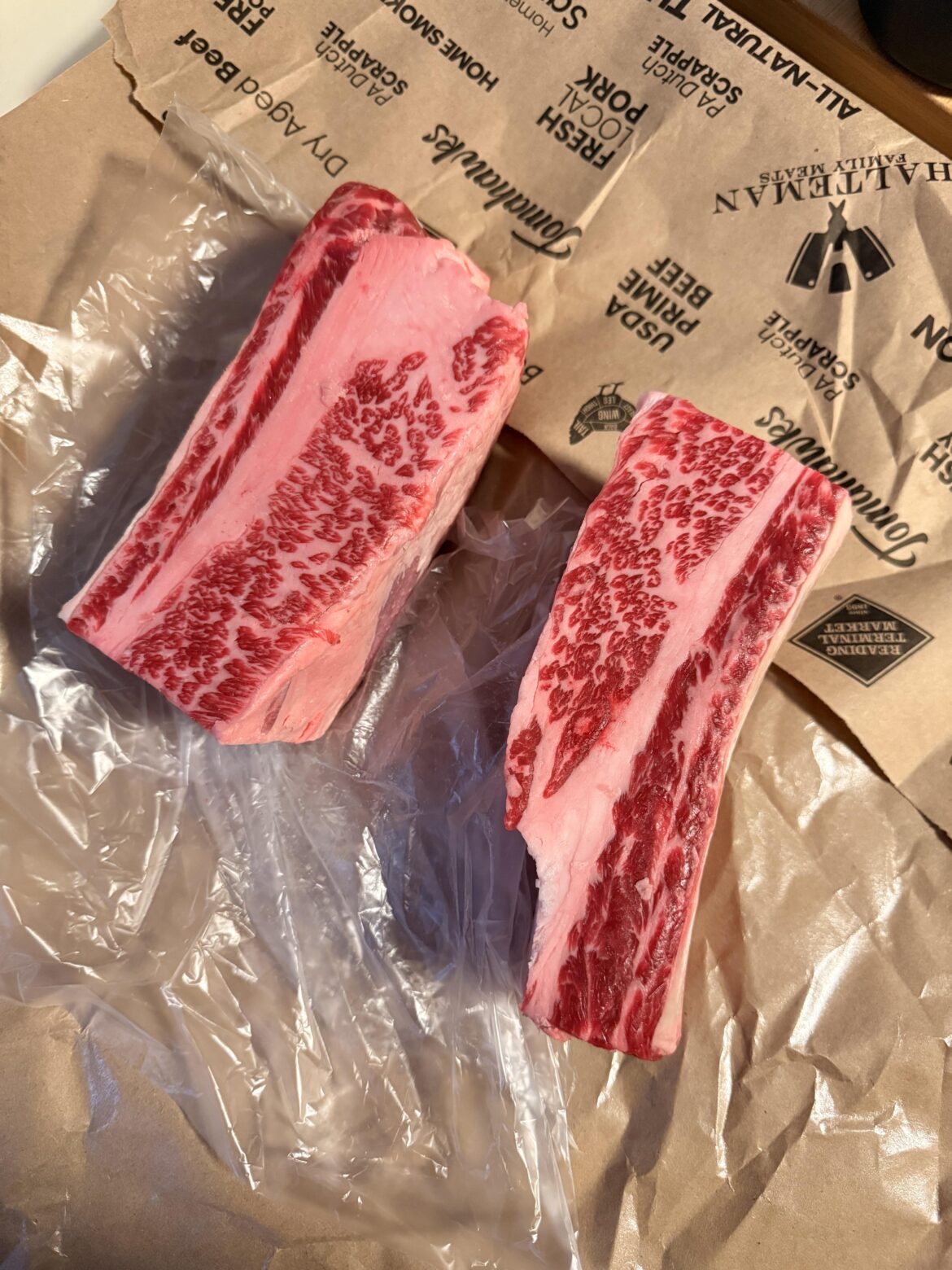 I went to the meat counter today to soothe the pain of a layoff. These short ribs caught my eye.