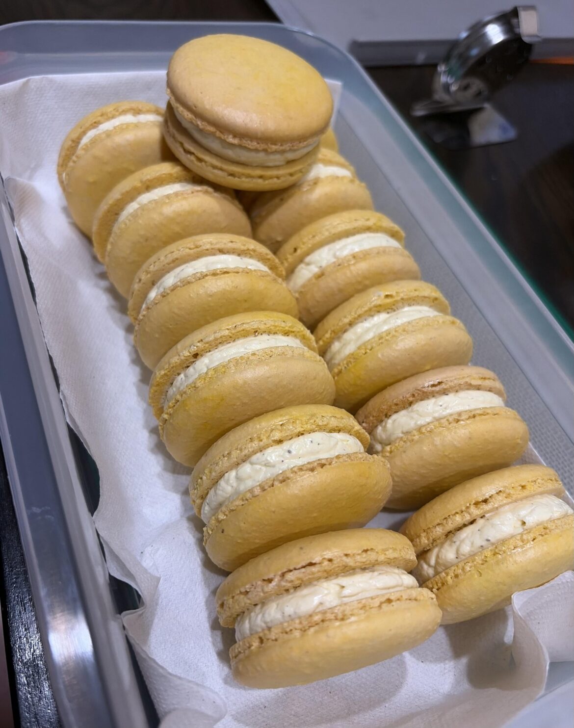 First macaron bake in my new convection oven. Korean banana milk flavor filling. Going to dial in my oven to mitigate the slight browning on some edges next time.