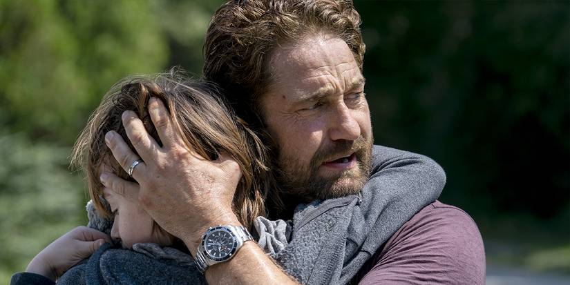 John holding his son