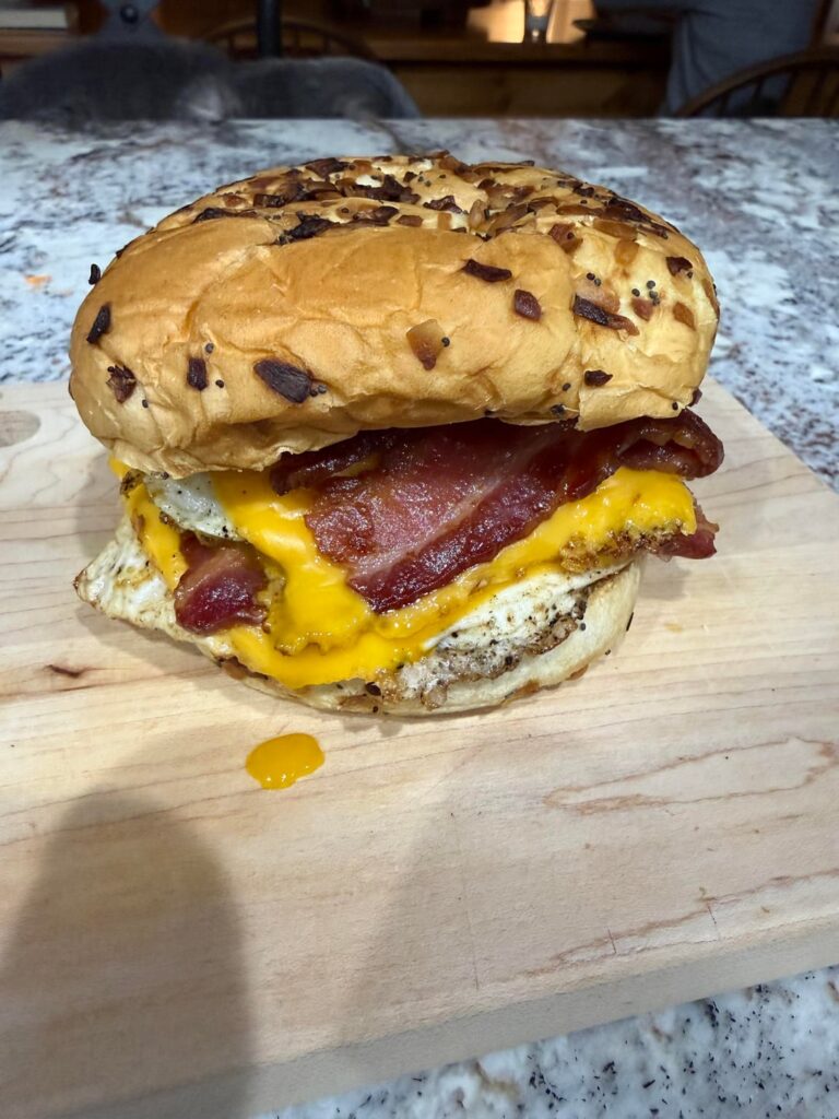 Double BEC on a toasted onion roll