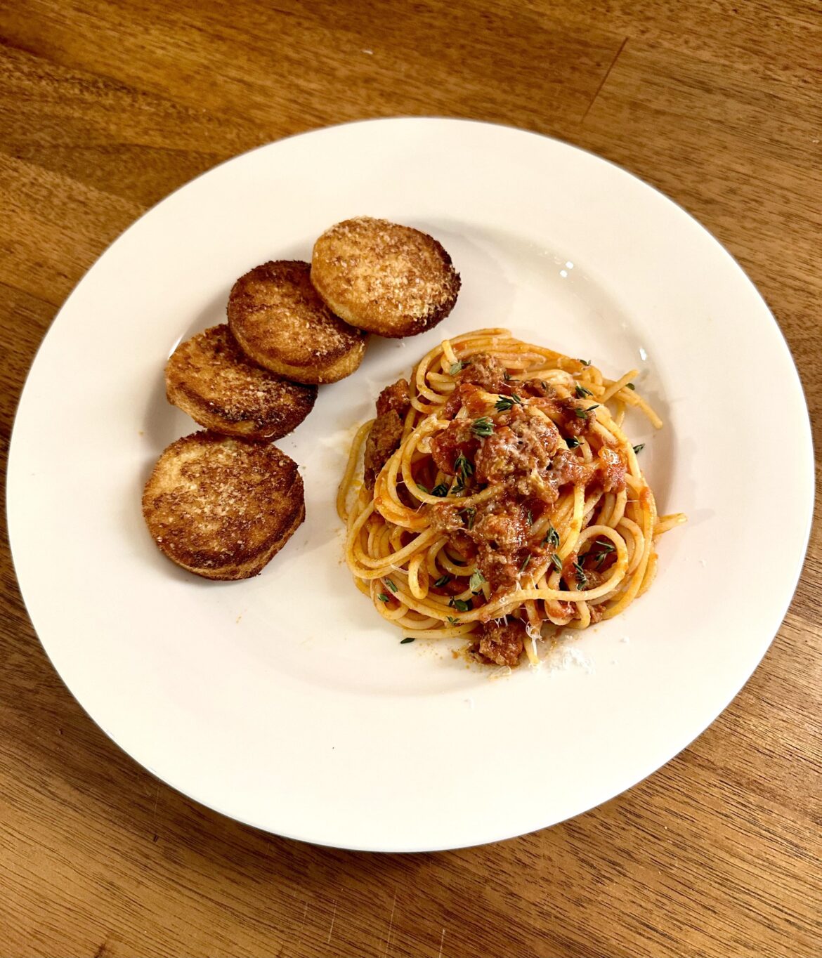 Pasta with Meat Sauce and Garlic Toast Rounds