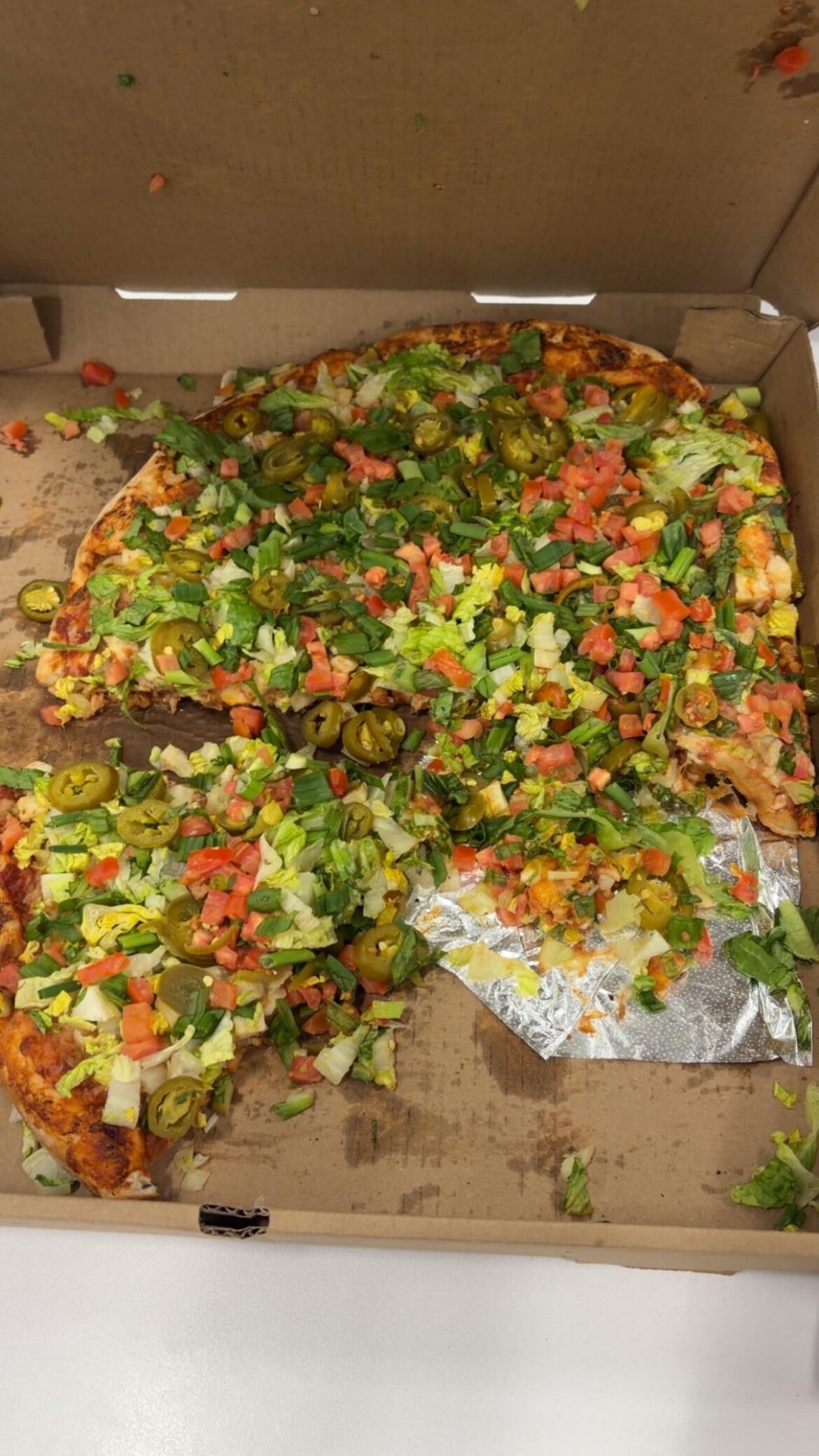 our work ordered us a salad pizza (lettuce jalapeños & diced tomatoes)