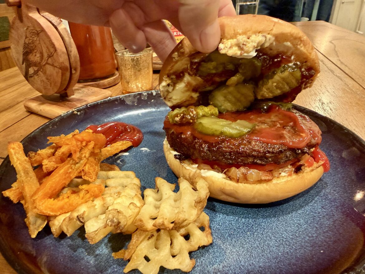 Son served burgers with goat cheese, bacon, caramelized onions, and fig jam.