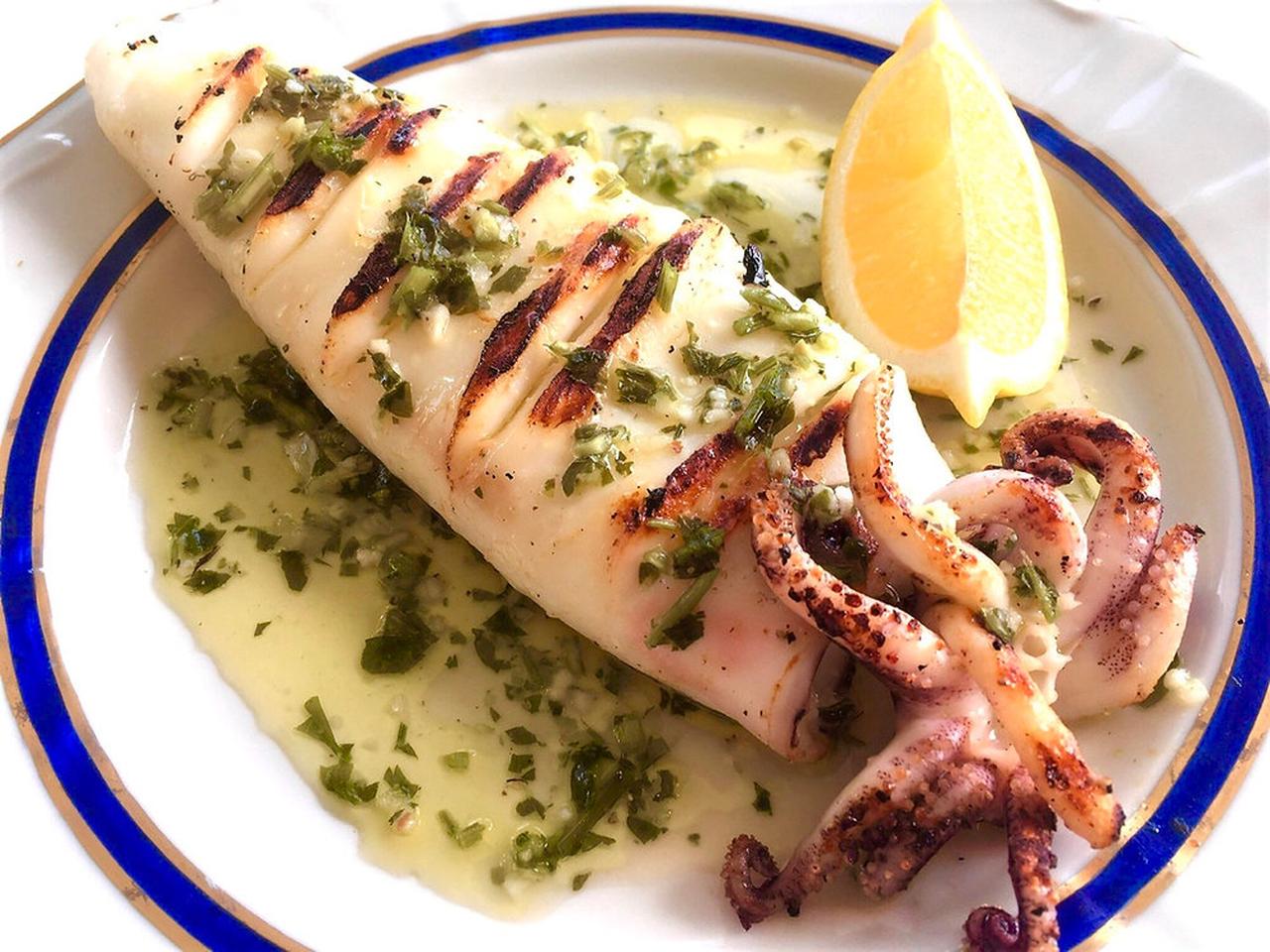 Stuffed squid, sliced into neat rounds, reveals its rice and herb filling, accessed on February 25, 2026. (Courtesy of Bute St Seafoodie)