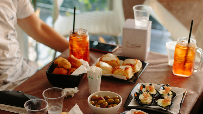 Aperol Spritz and aperitivo snacks in a bar in Italy
