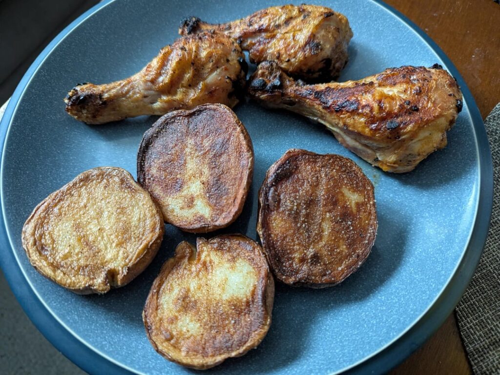 Crispy grilled chicken drumsticks, pan fried home garden Norland red potatoes & wok steam fried baby Bok choy in oyster sauce
