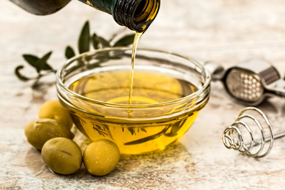 Extra-virgin olive oil, a major component of the Mediterranean diet, protects against cognitive decline. Image credit: Steve Buissinne.
