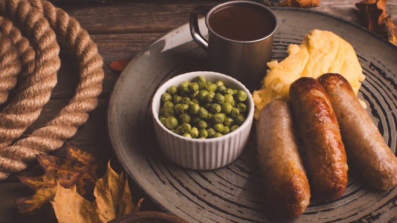 Bangers and mash with mushy peas.