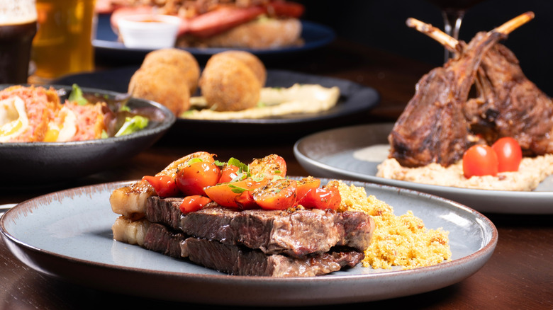 Different dishes at a steakhouse