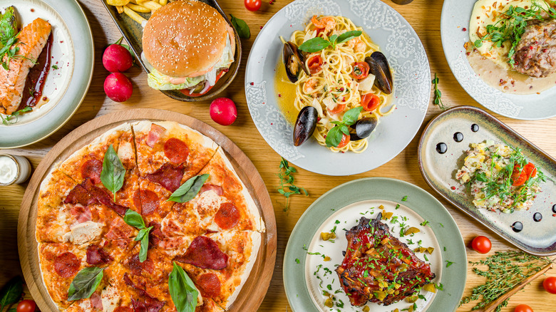 Various plates of food including pasta