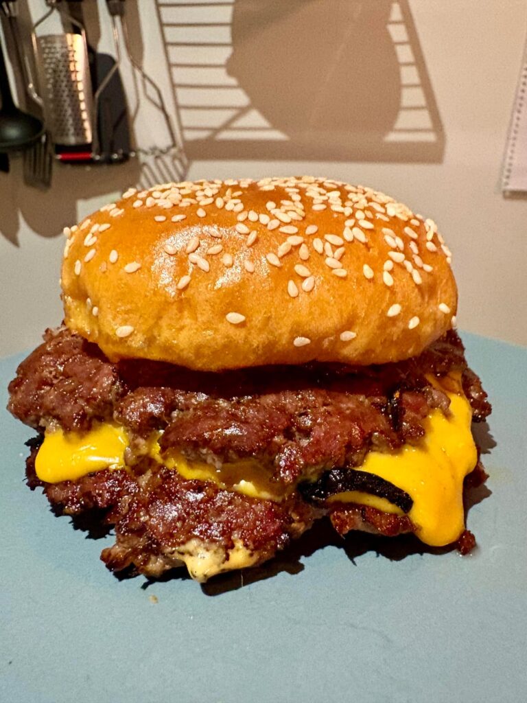 Drunken double cheeseburger with spicy burger sauce.