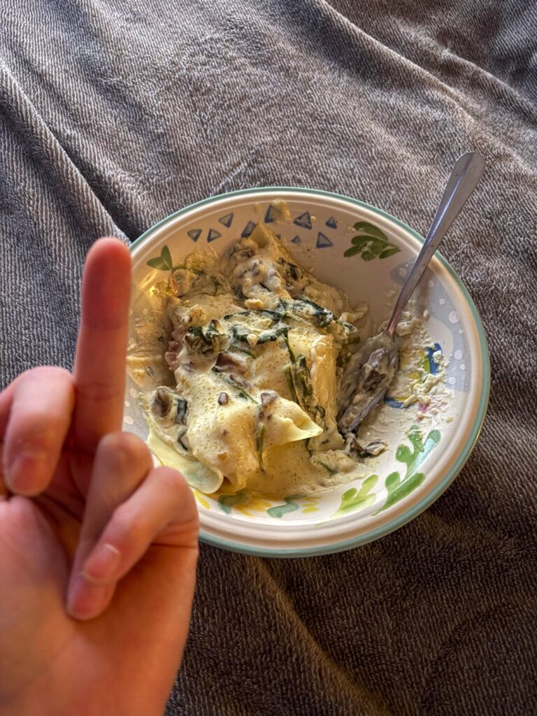 Drank two bottles of $4 wine from Aldi and made mushroom ravioli with cream sauce.