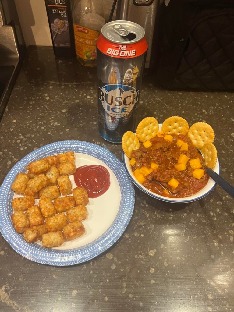 Locally grown black angus sweet sausage chili with some tater tots. Sharp cheddar cheese and sour cream(not shown) to top off.