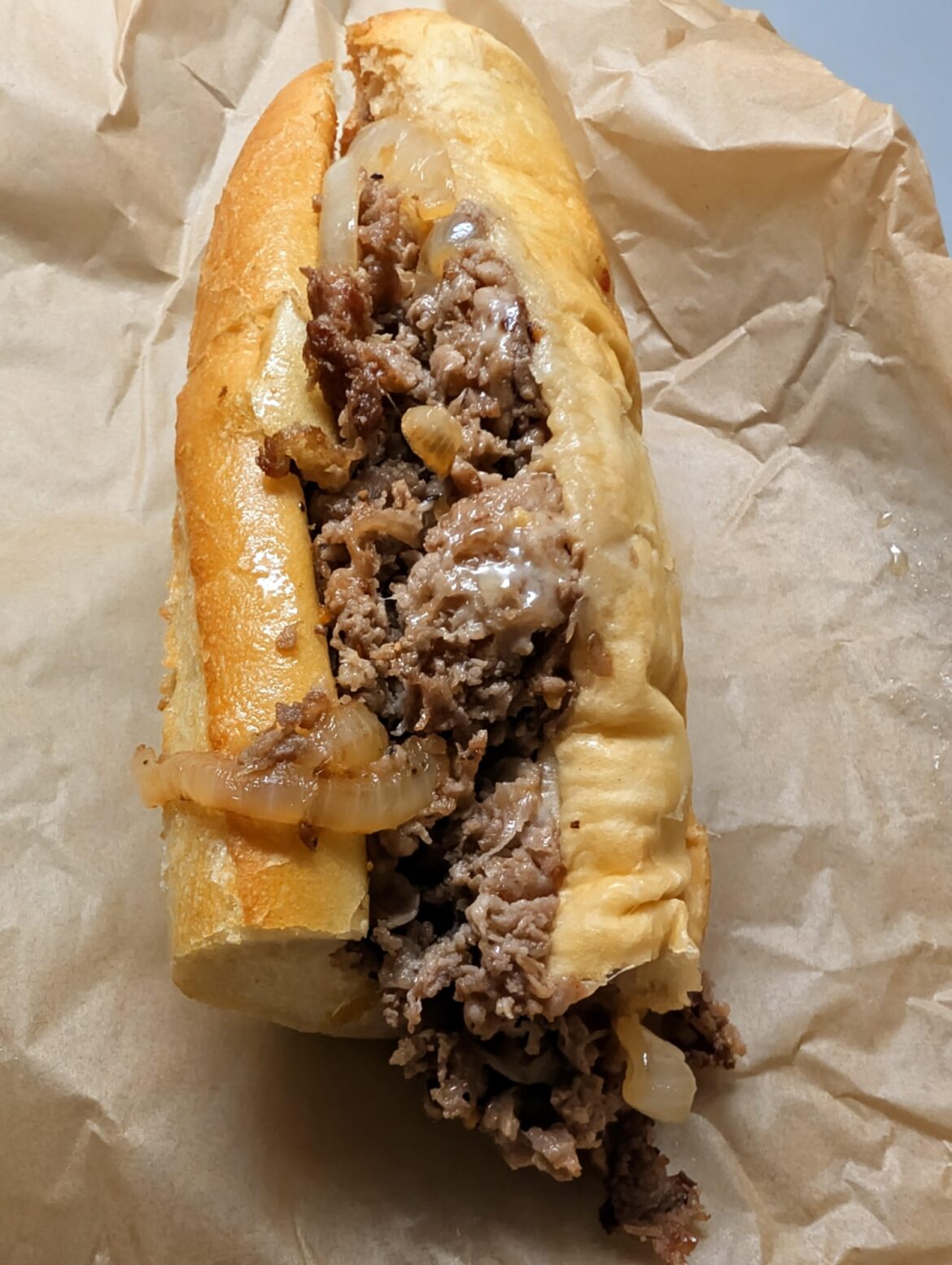 [homemade] cheese steak with onions and provolone.
