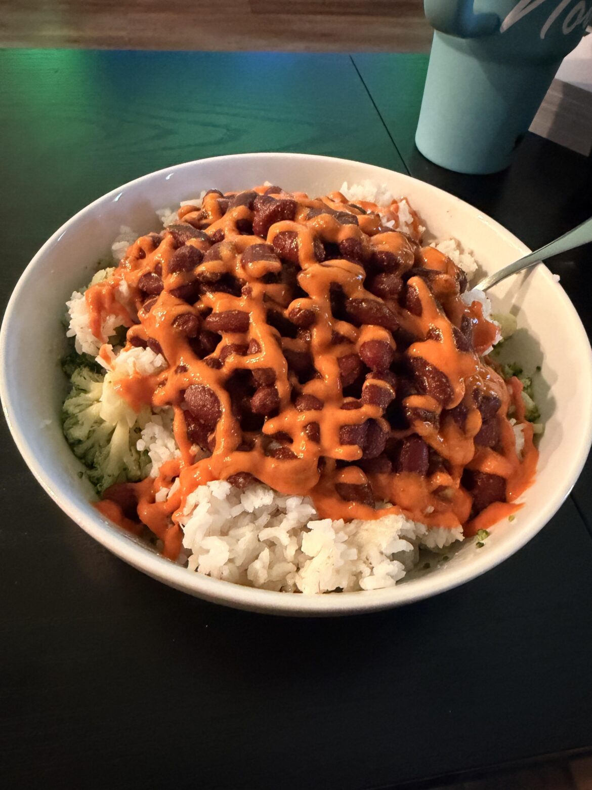 Beans, broccoli, and rice bowl topped with Melinda's Black Truffle. ~700 calories, tons of fiber.