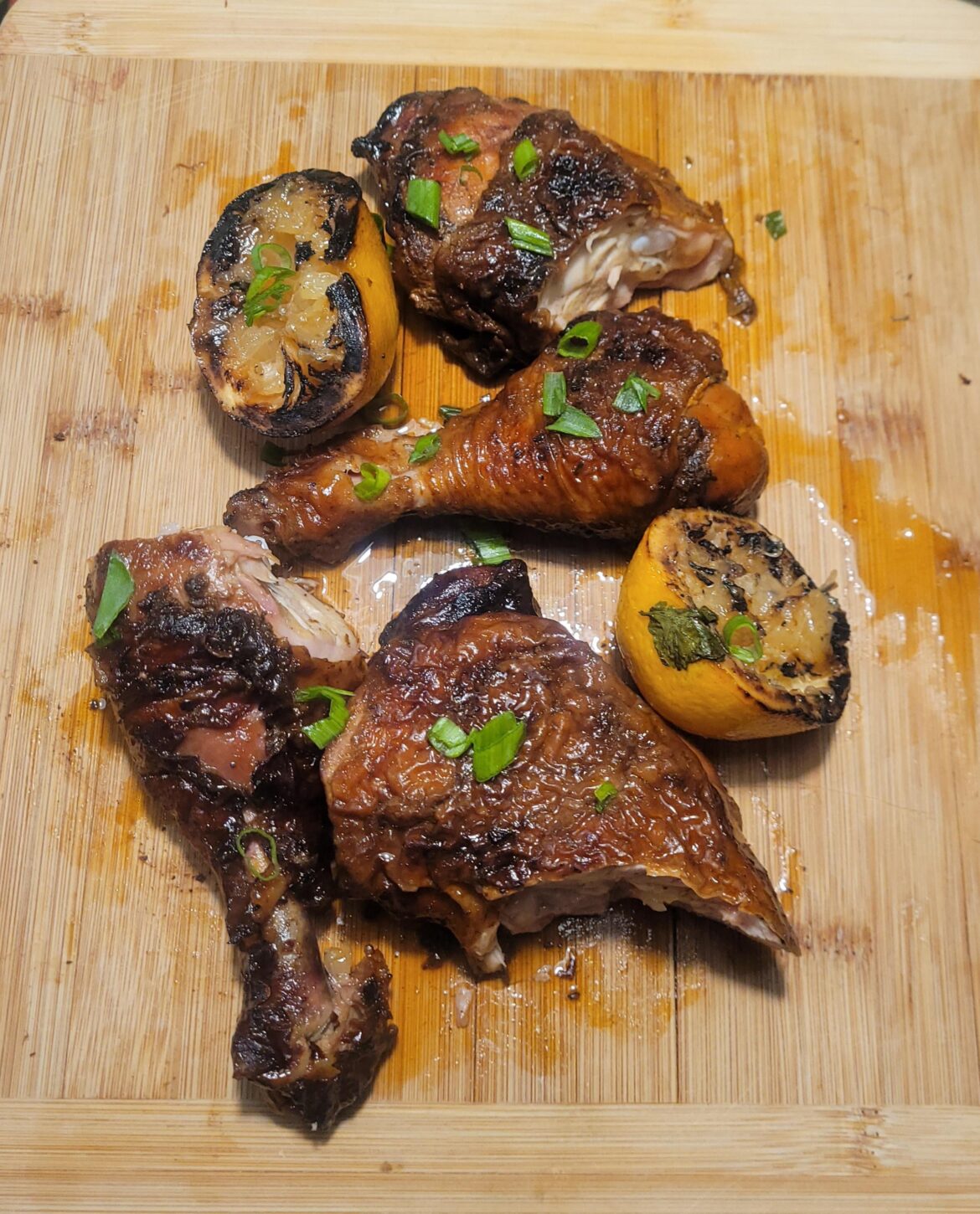 Juicy Chicken Leg Quarters Over Open Fire