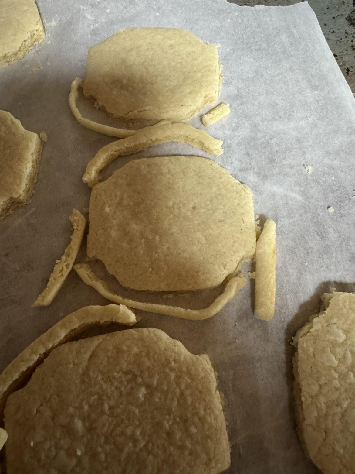 Chelsweets “no spread” cream cheese sugar cookie review… definitely the best cookie taste so far… but it spread so much it required a “double stamp” as I call it- I had to recut the cookie after it cooked because too much spread.