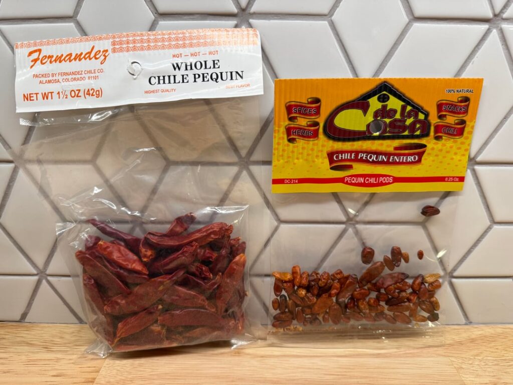 Two very different looking pequin chiles.