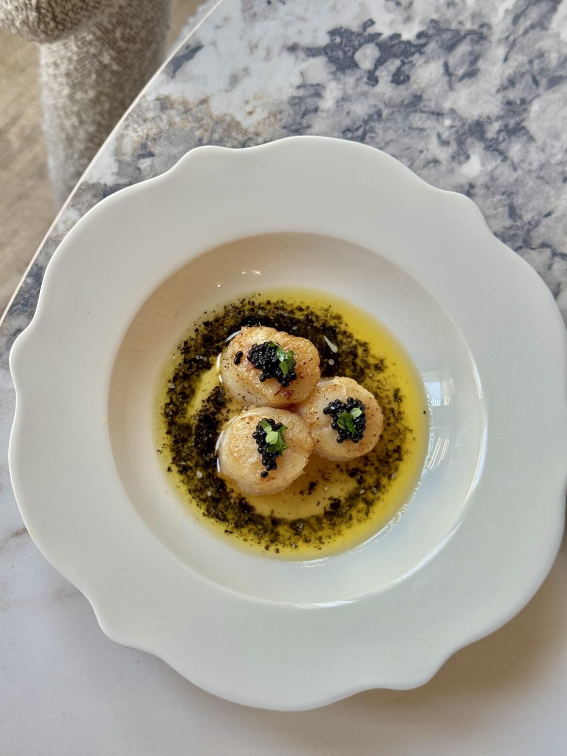 Scallops and caviar with rosted nori sauce Scallops and caviar with rosted nori sauce