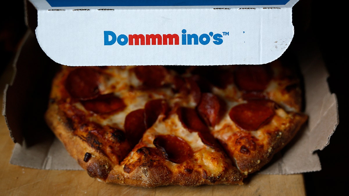 Pepperoni pizza in Domino's box