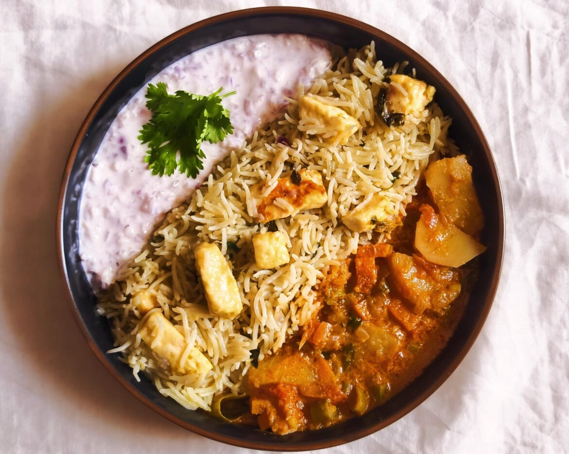 Paneer pulav paired with vegetable curry and Onion Raitha.